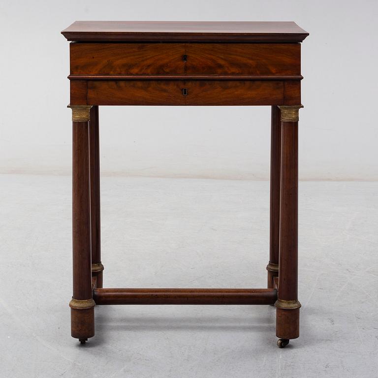A mid 19th century sewing table.
