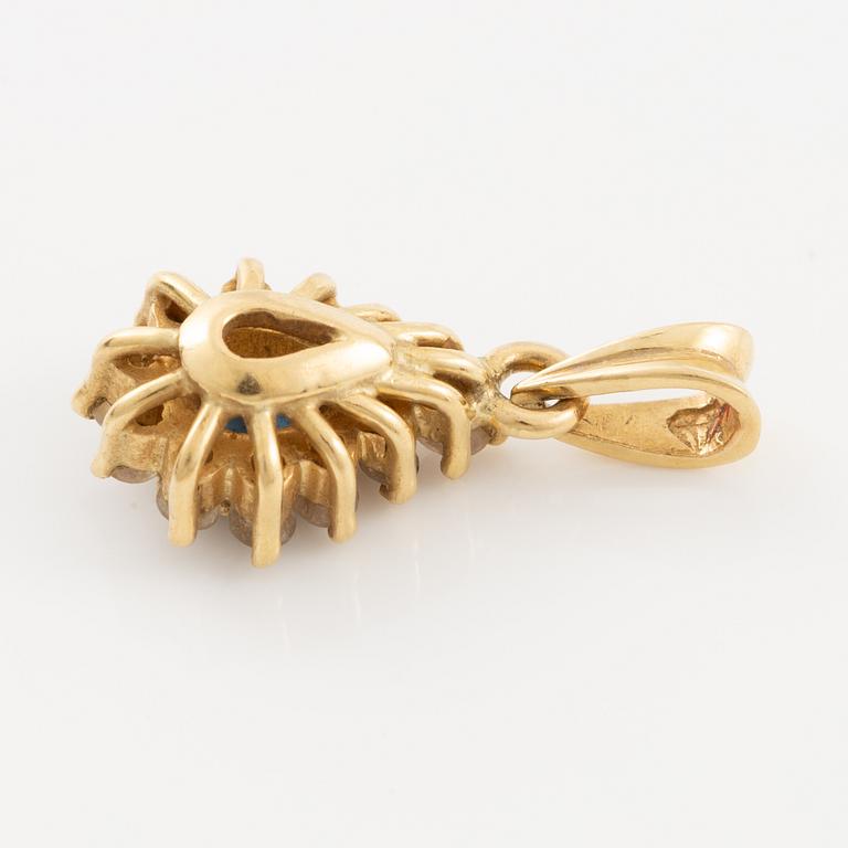 Pendant, 18K gold, set with a sapphire and brilliant-cut diamonds.