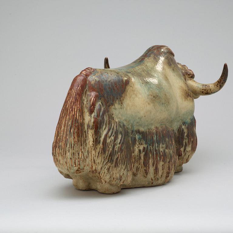 A Kaj Lange stoneware sculpture of a bison, Royal Copenhagen, Denmark 1966.