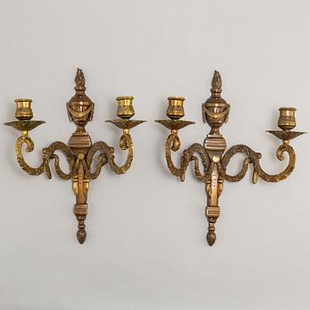 A pair of early 20th century gustavian style wall-lights.