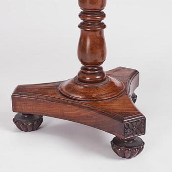 A near pair of Regency rosewood gueridon tables in the manner of Thomas Hope (1769-1831).