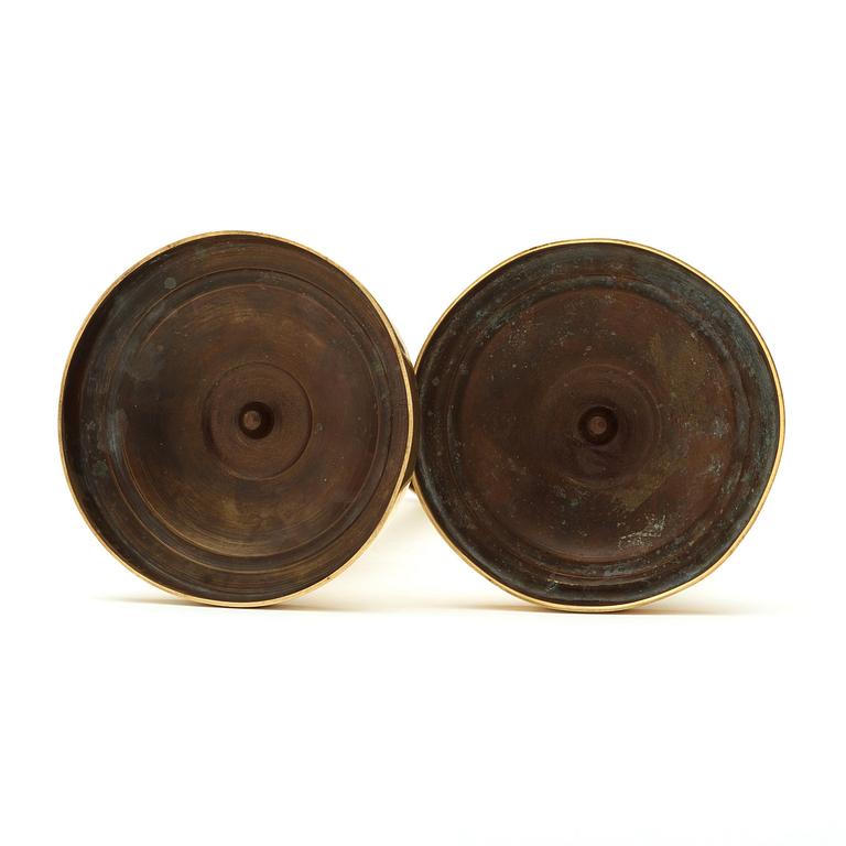 A pair of Empire  early 19th century candlesticks.