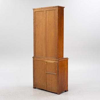 A mahogany veneered cabinet, late 19th Century.
