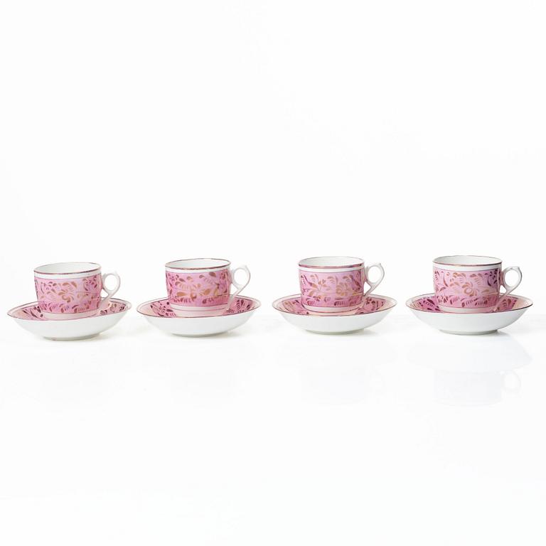 Twelve cups and saucers, England, 19th century.