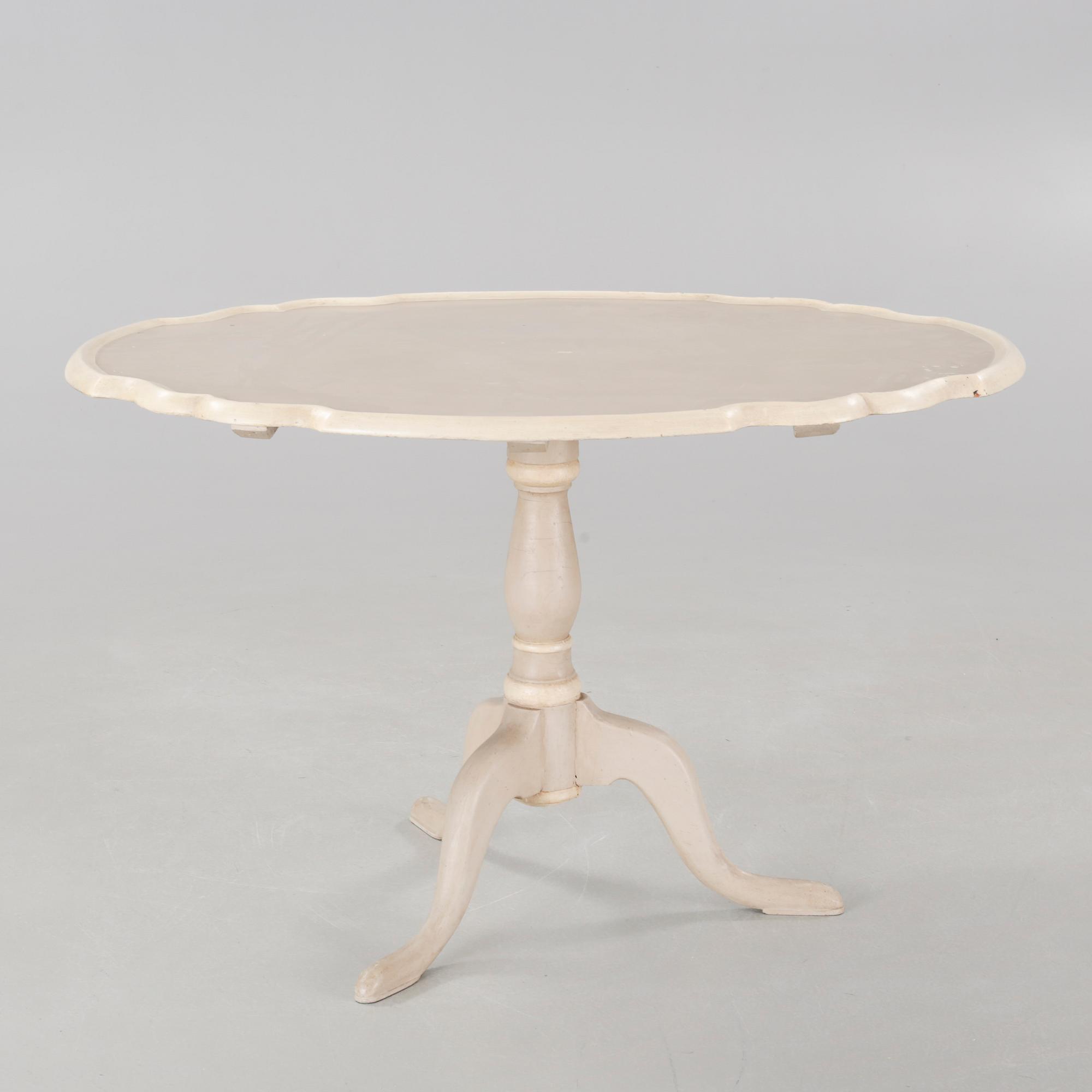 A late 19th century drop-leaf table.