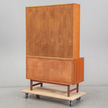 A second half of the 20th century teak veneered cabinet, possibly Denmark.