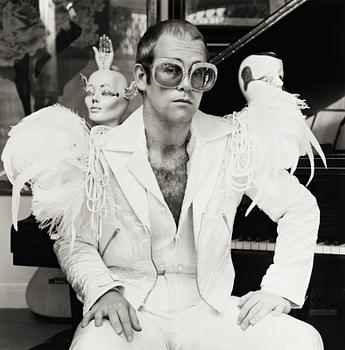 217. Terry O'Neill, "Elton John, Feathers", 1970's.