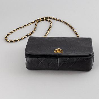 Chanel, a quilted leather 'Flap' bag, 1989-91.