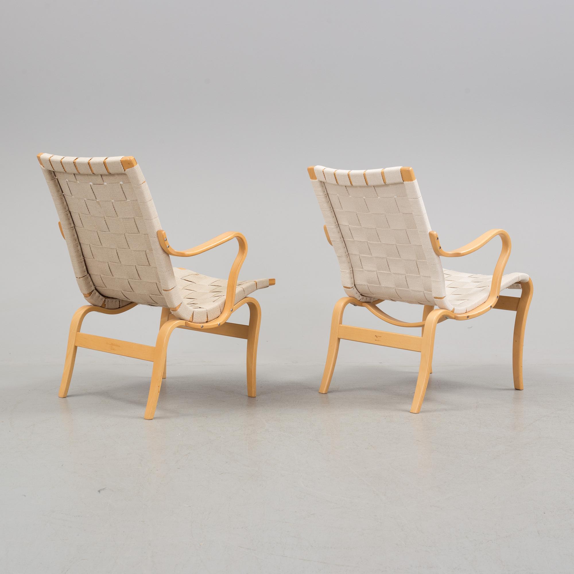 two armchairs by Bruno Mathsson, one "Eva" and one "Mina".