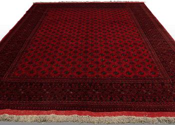 An Afghan carpet, ca 380 x 310 cm.