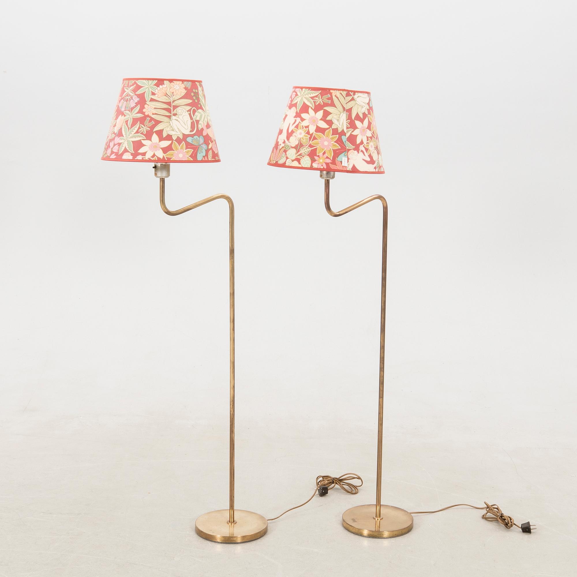 Floor lamps, a pair probably Aneta, late 1900s.
