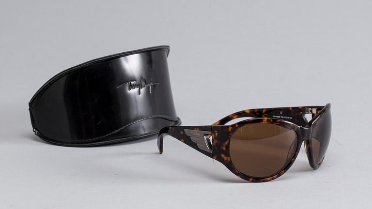 A pair of Thierry Mugler sunglasses.