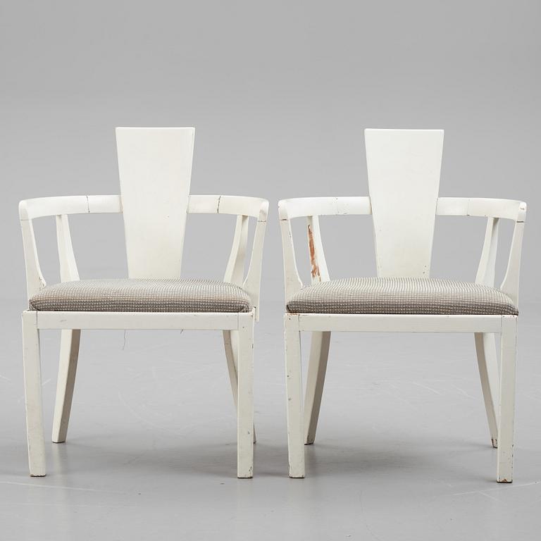 A pair of painted armchairs, first half of the 20th Century.