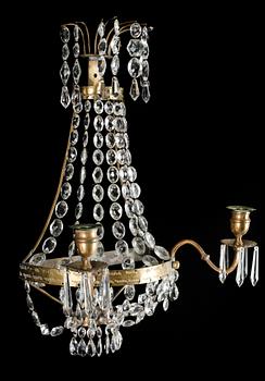 VÄGGLYSTRAR, ett par, 1900-talets första hälft.