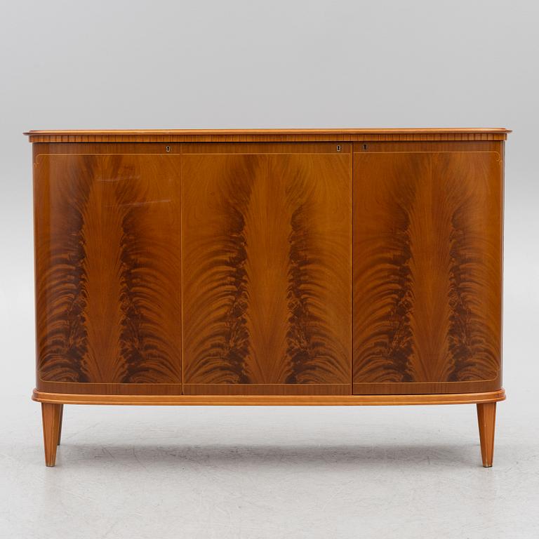 A cabinet, mid-20th Century.