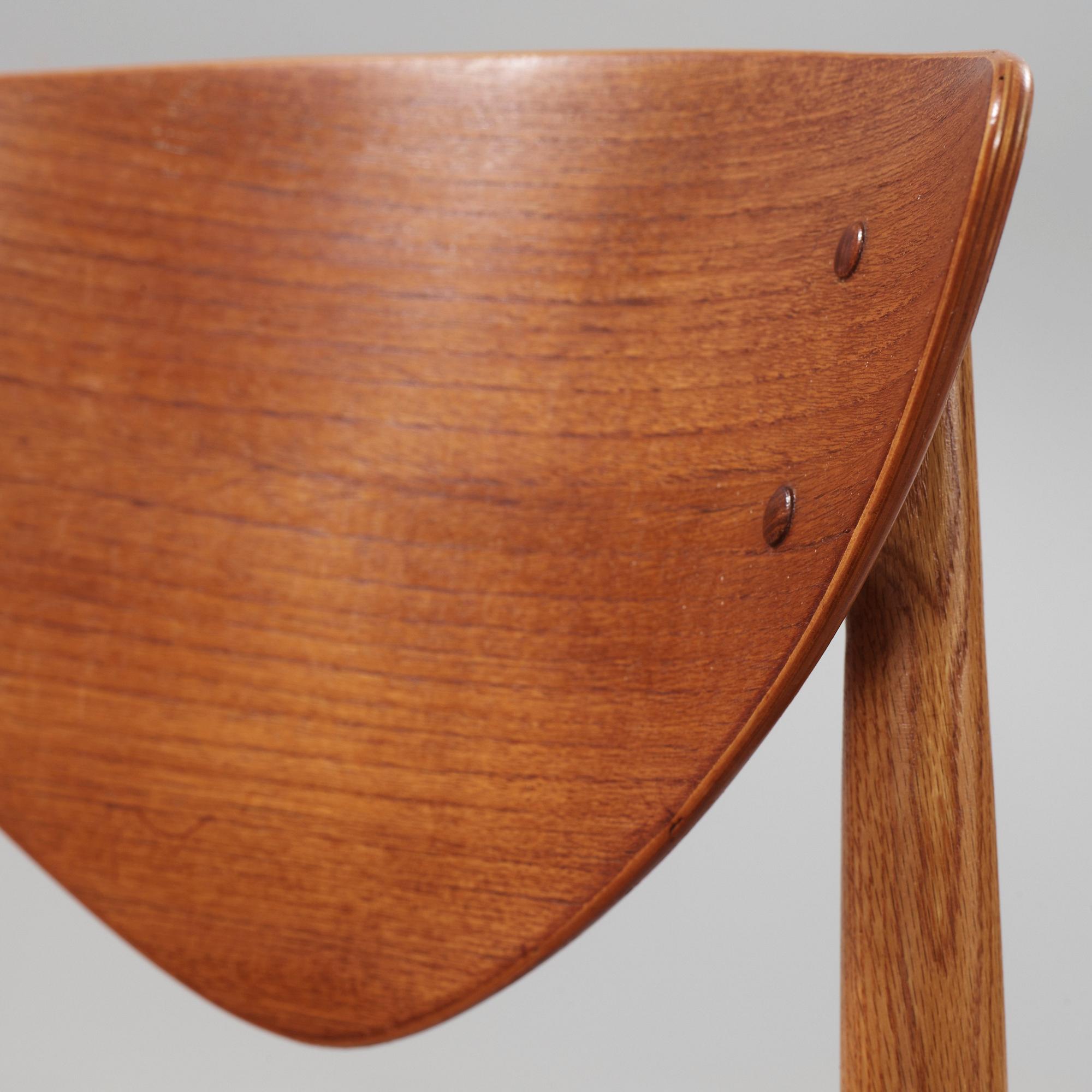 A set of four Peter Hvidt and Orla Mølgaard Nielsen teak dining chairs, Bodafors, Sweden 1962.