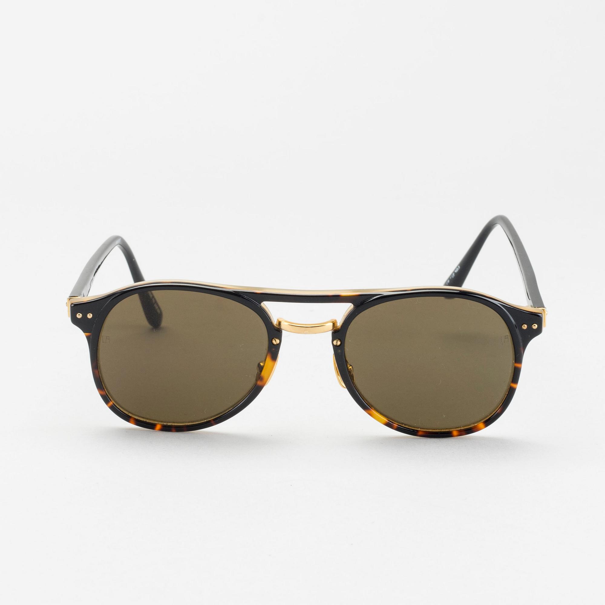 Sunglasses by LINDA FARROW LUXE.