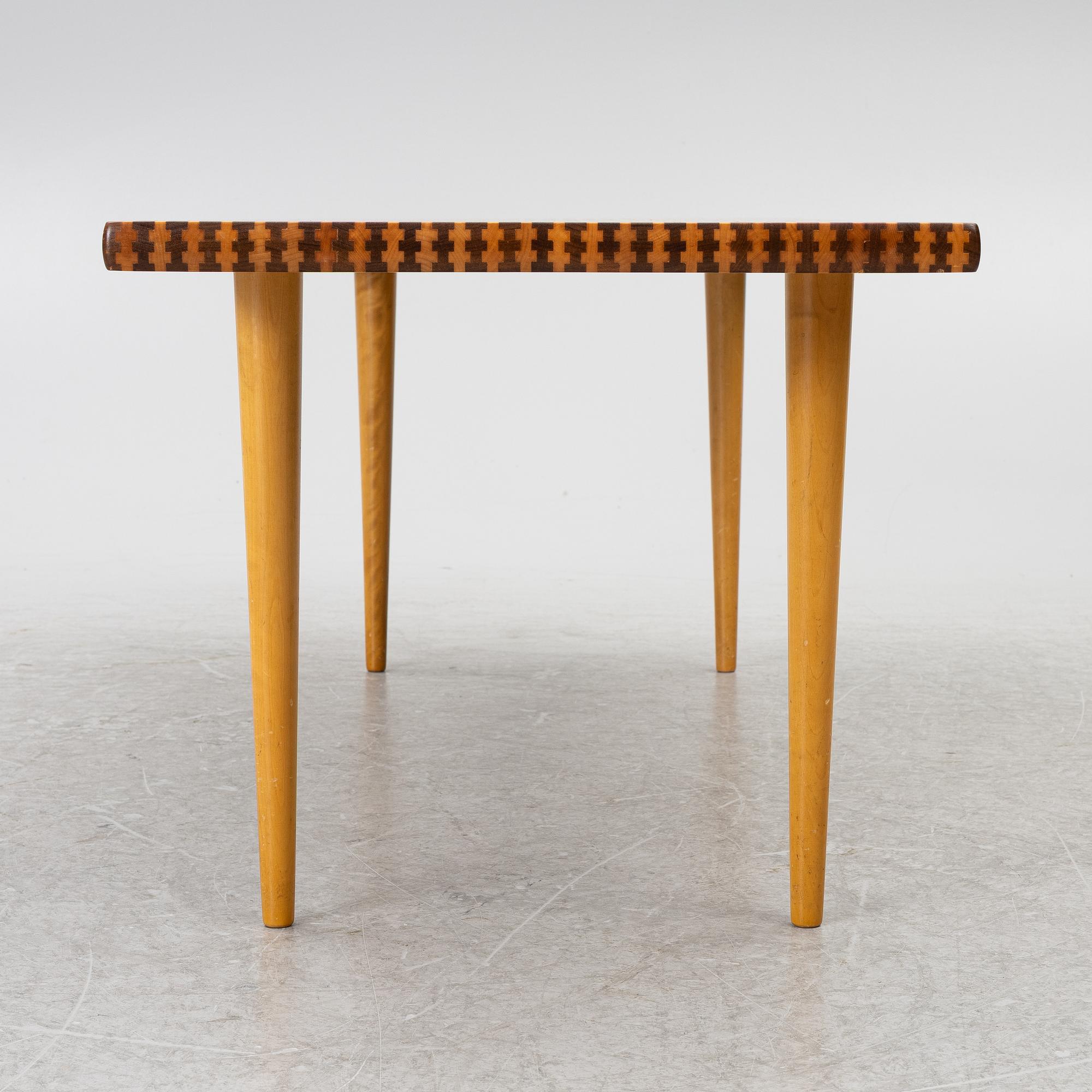 NK-DESIGN, a model 579-041 coffee table from the Triva collection, AB Nordiska Kompaniet, model launched in 1954.