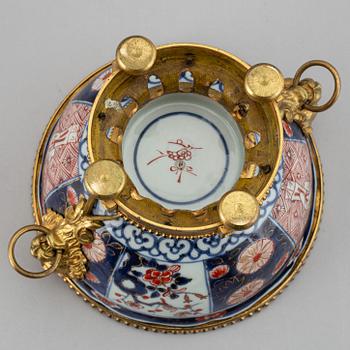 A Japanese imari bowl, with  European bronze mount, 19th century.