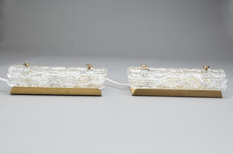 CARL FAGERLUND, a pair of glass and brass Orrefors wall lamps.