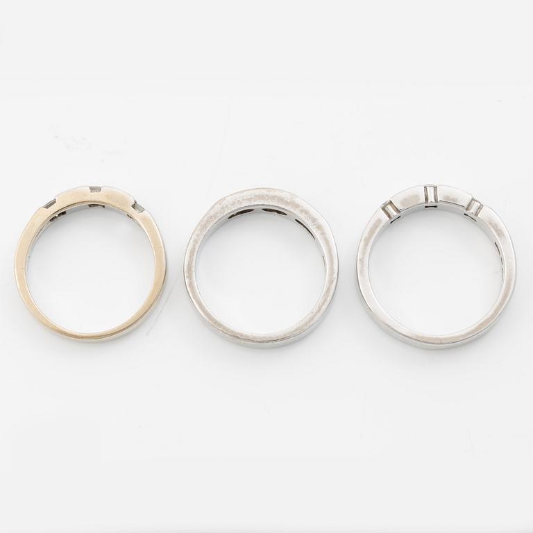 Three rings, 18K white gold with brilliant-cut and princess-cut diamonds.