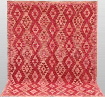 A Kilim rug, approx. 248 x 190 cm.