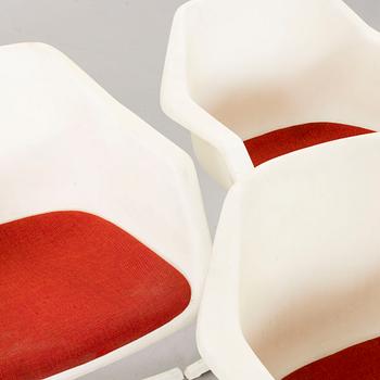 Six Robin Day armchairs.