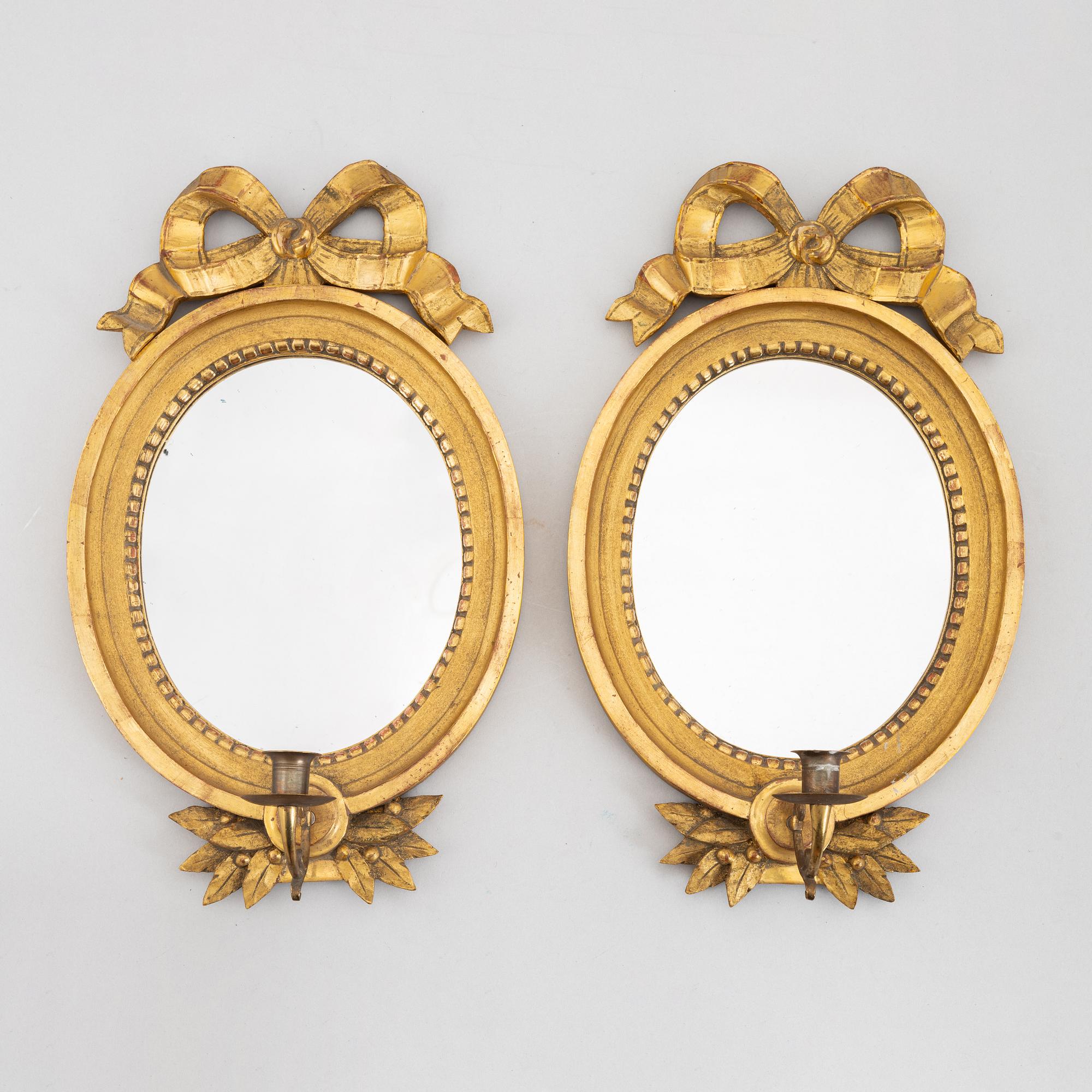 A pair of Gustavian style mirror sconces, beginning of the 20th century.