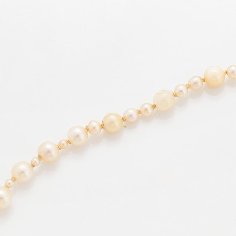 A cultured pearl necklace with a WA Bolin clasp.