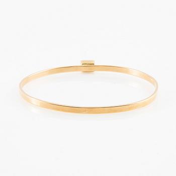 Wiwen Nilsson, Armring 18K gold with a synthetic white spinel, Lund 1967.