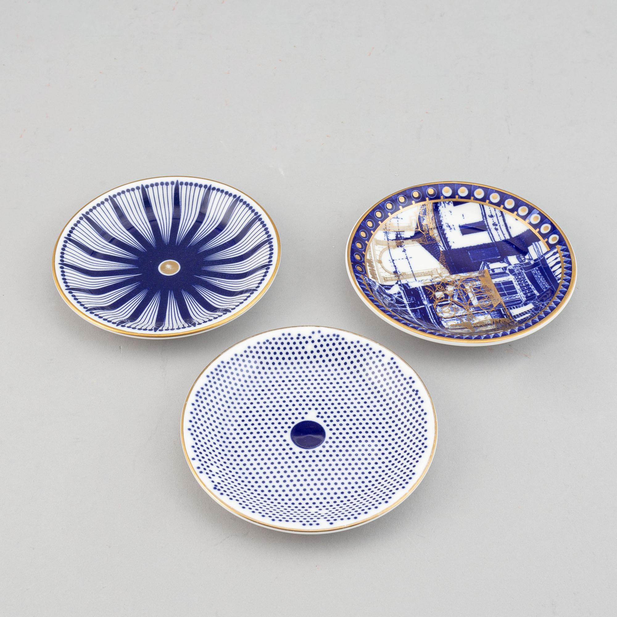 A 24 pcs bone china service from Flux Stoke on Trent, different motives and designers, designed in 2012. England.