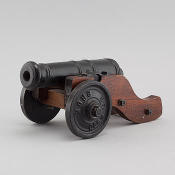 A 20th century salute cannon with wooden gun carriage by Stafsjö Bruk, Sweden.