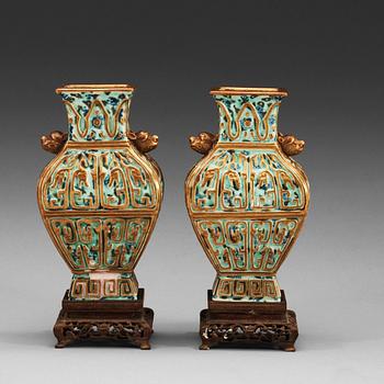 A pair of vases, late Qing dynasty (1644-1912), with Qianlong sealmark.