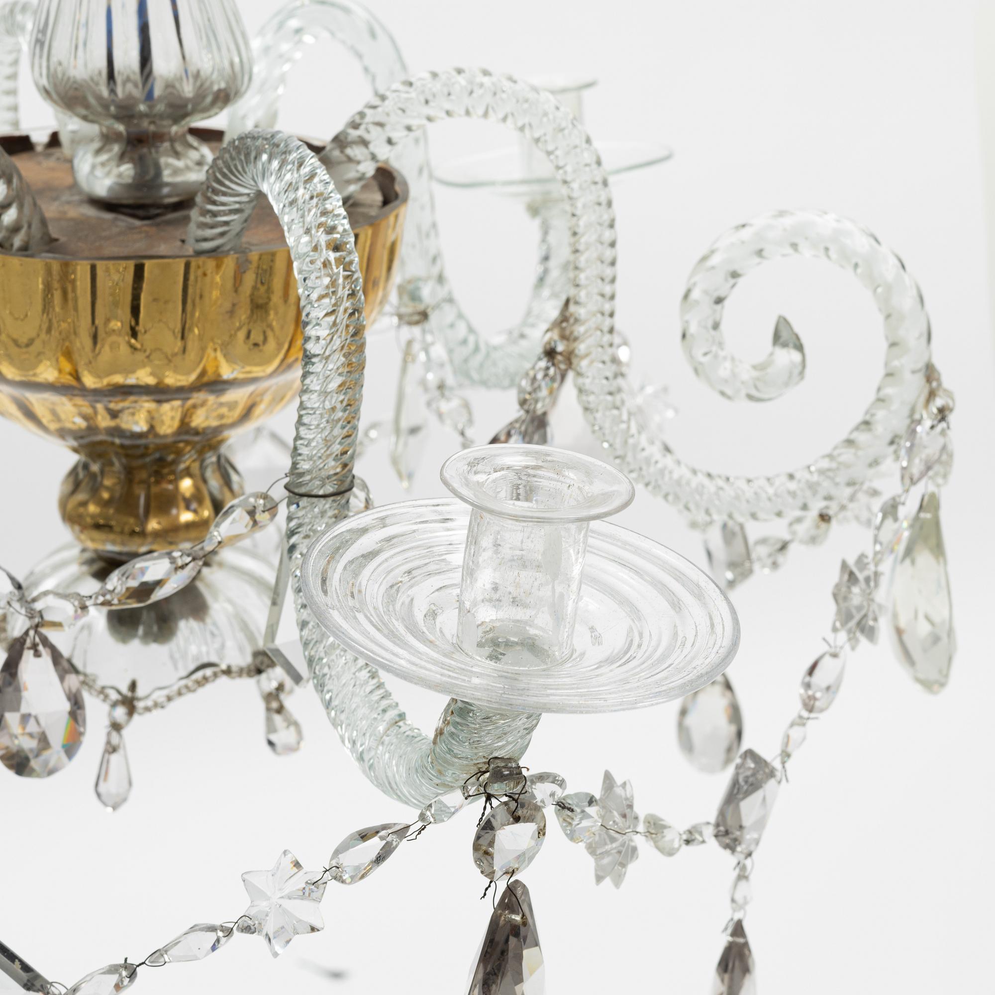 A European glass three-light chandelier, circa 1800.