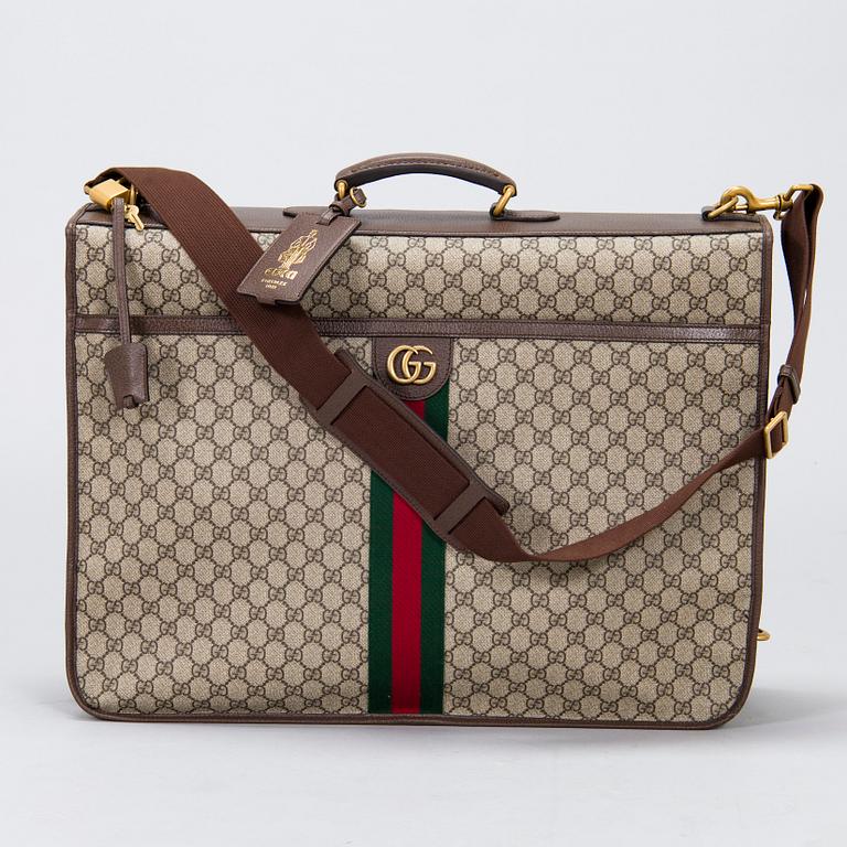 Gucci, a 'Savoy' garment bag.