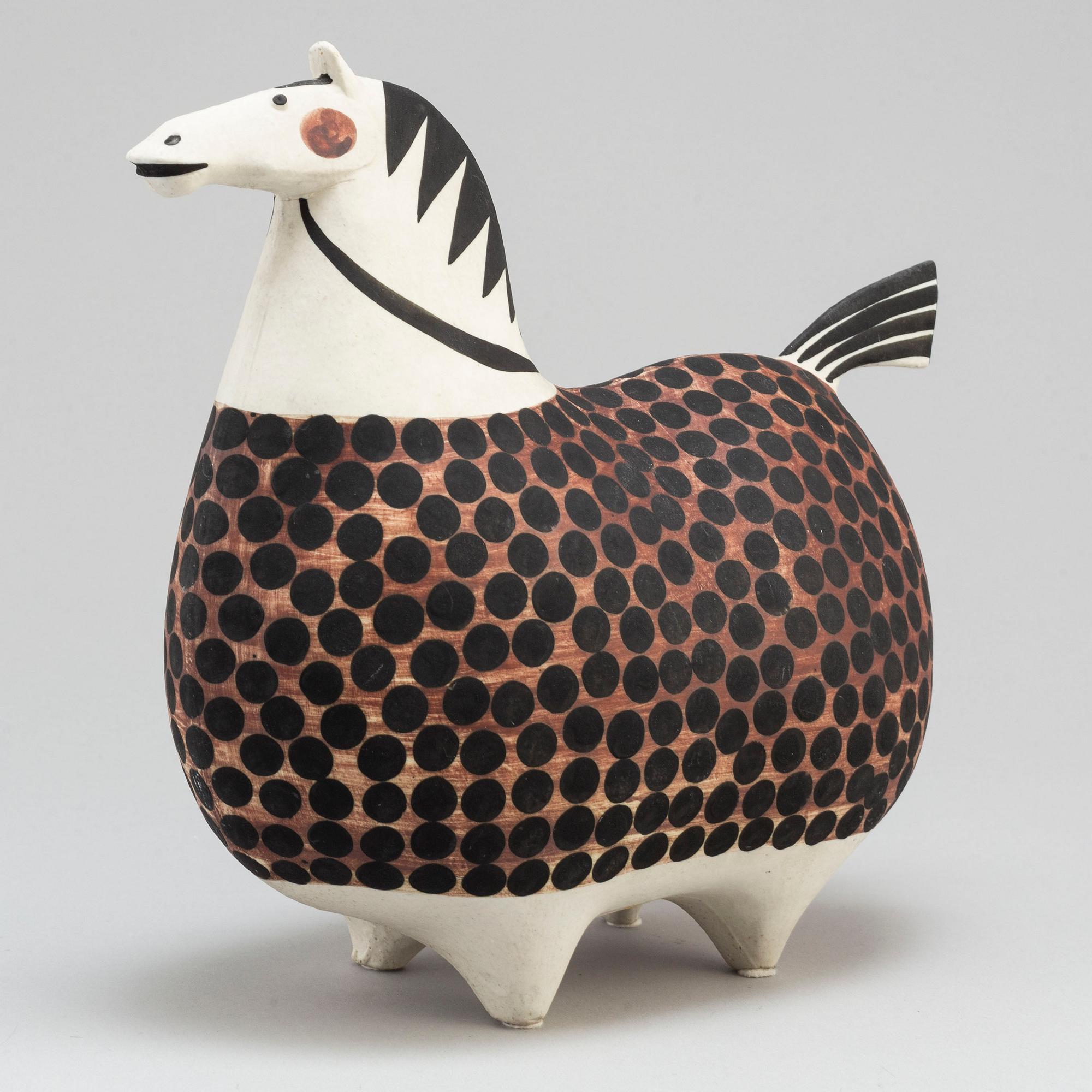 A 'Springare' stoneware figurine by Stig Lindberg, Gustavsberg.
