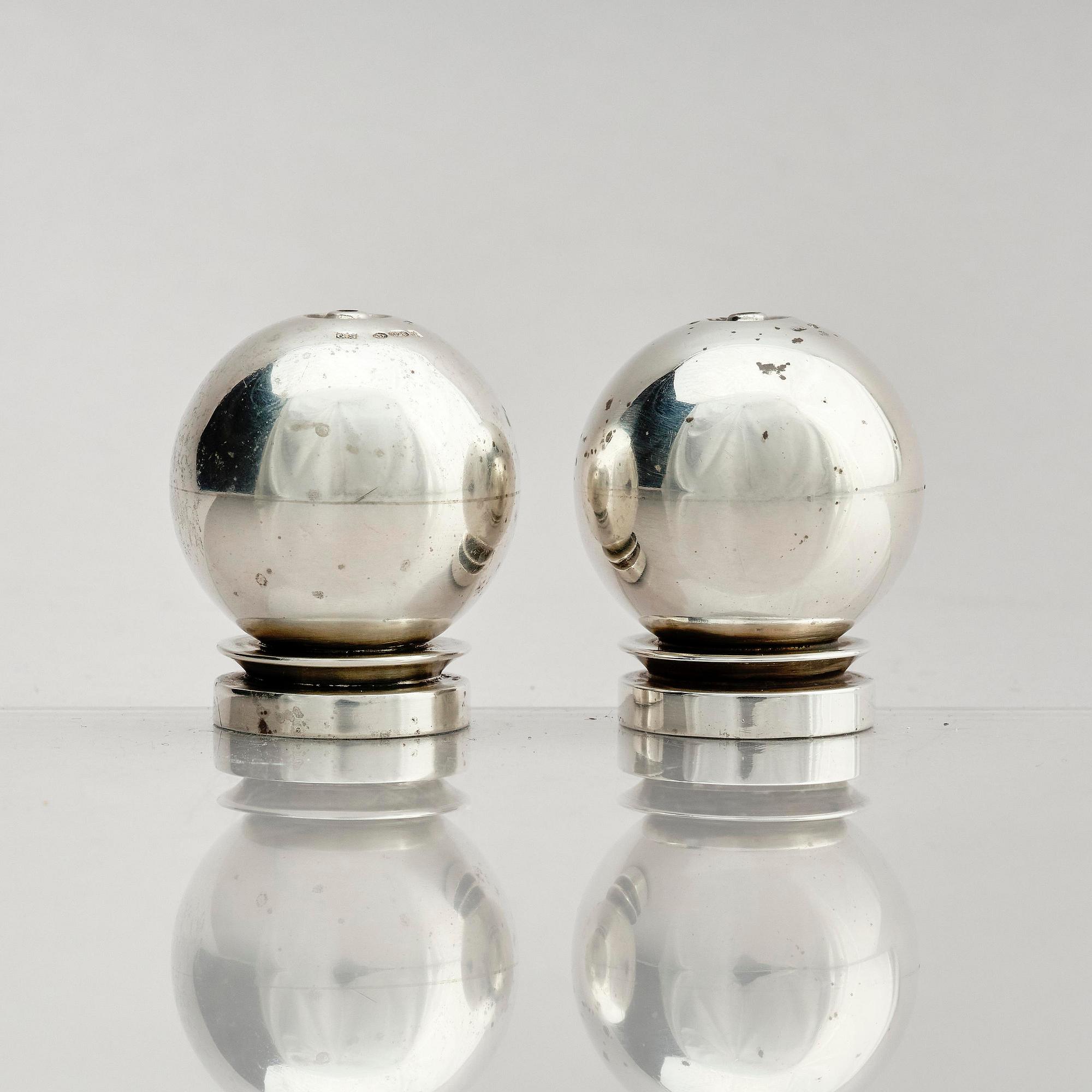 Georg Jensen, a pair of sterling silver salt shakers, model 'Pyramid/ Pyramide', design Harald Nielsen, no 632, Copenhagen after 1945.