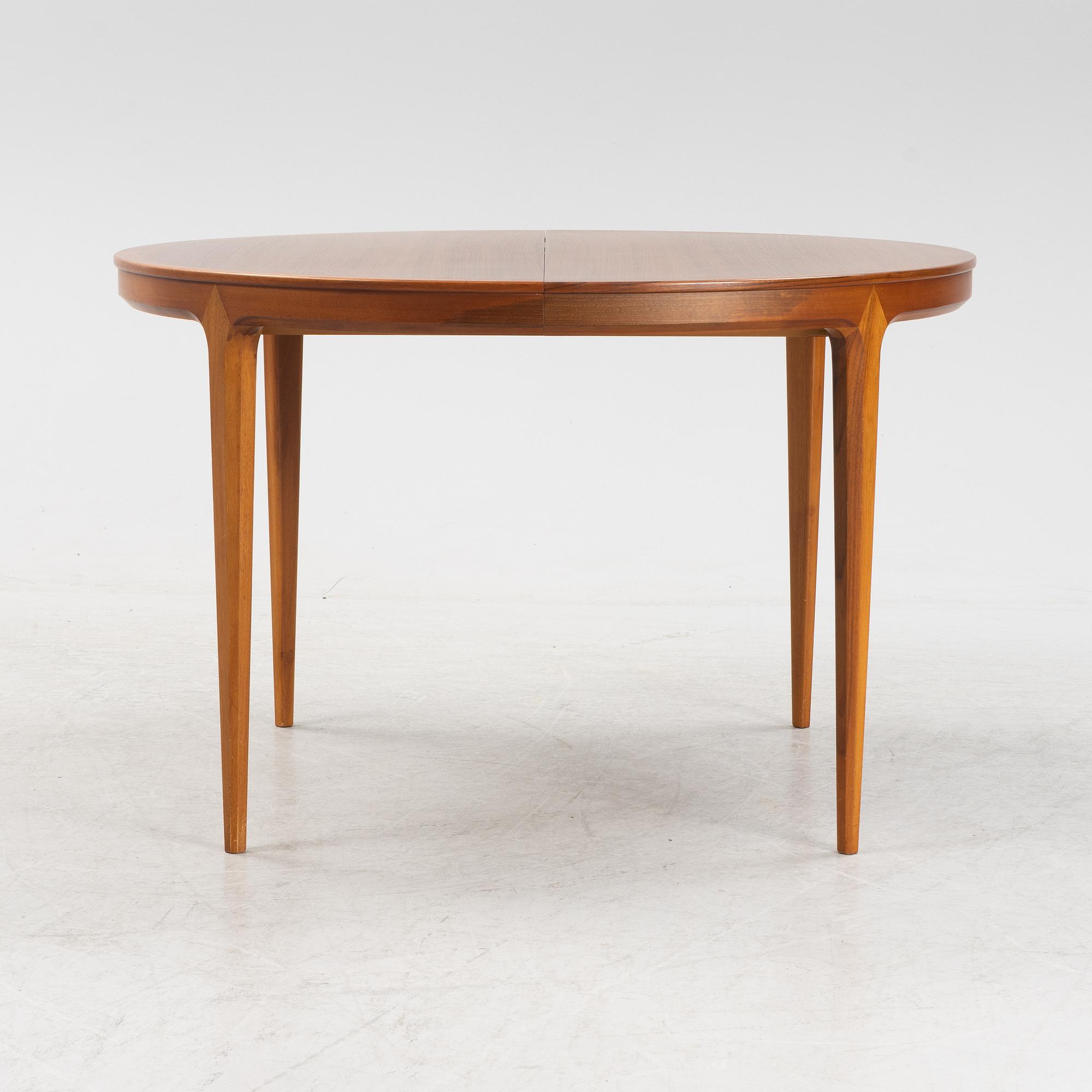 A 'Diamant' walnut dining table by Bertil Fridhagen, for Bodafors, 1960s.