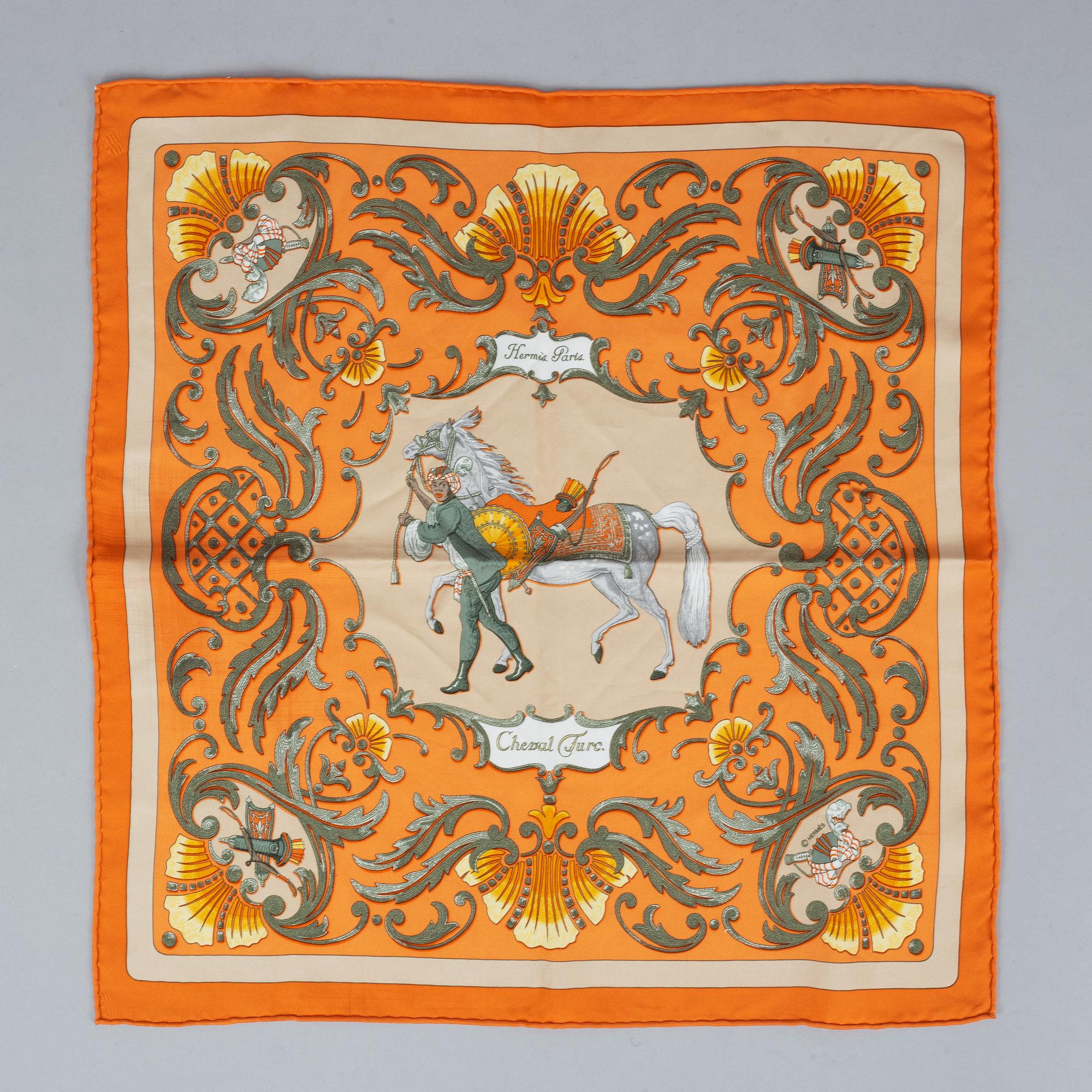 Hermès, scarf and leather cover.