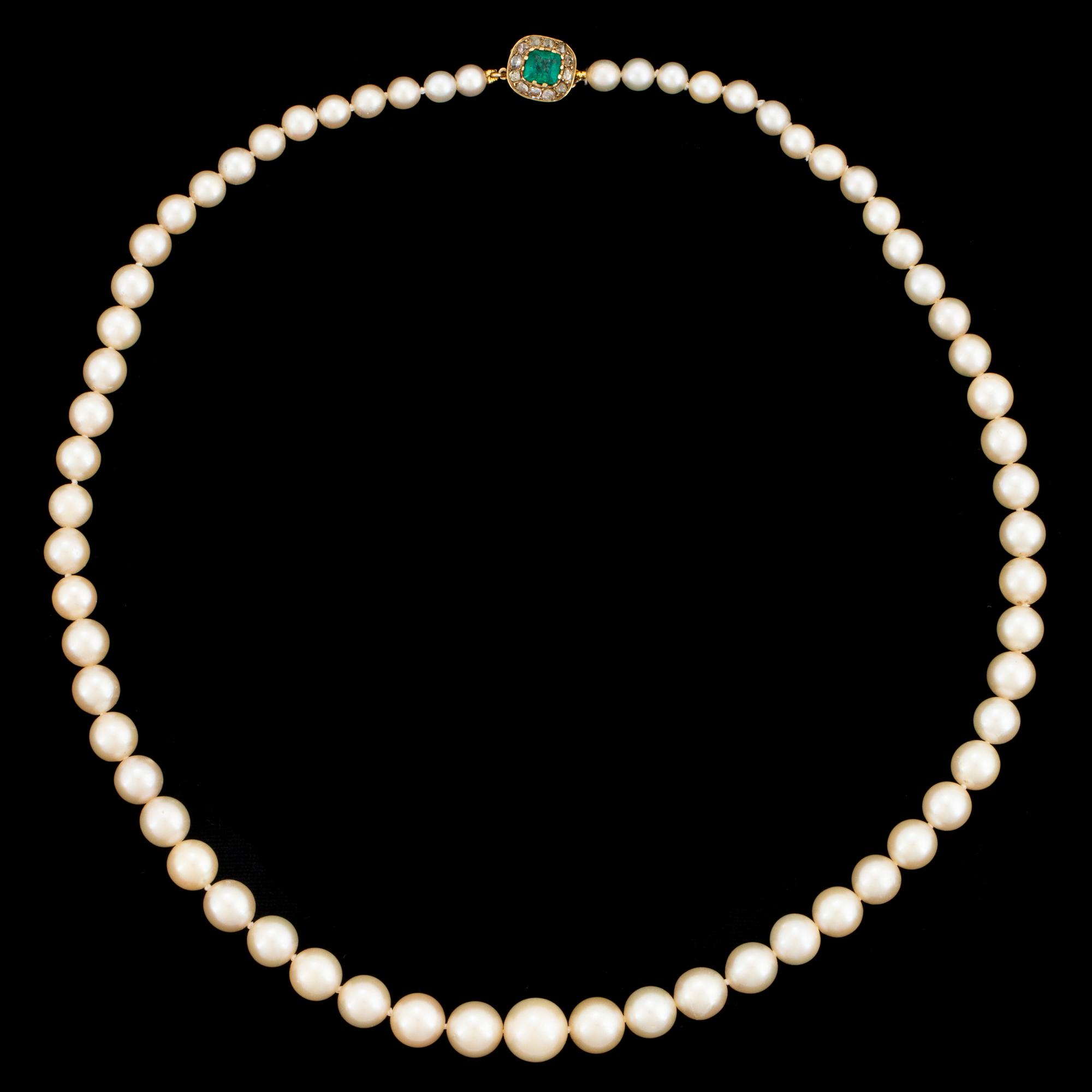Cultured calibrated pearl necklace, clasp with emerald and old-cut diamonds.