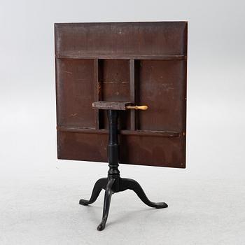 A tilt-top table, around 1800.