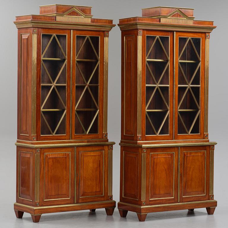 A pair of Russian mahogany and brass-mounted Jacob-style bibliothèques, modern with old parts.