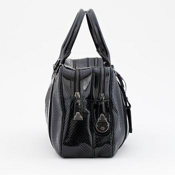 BURBERRY, a black patent leather bag.