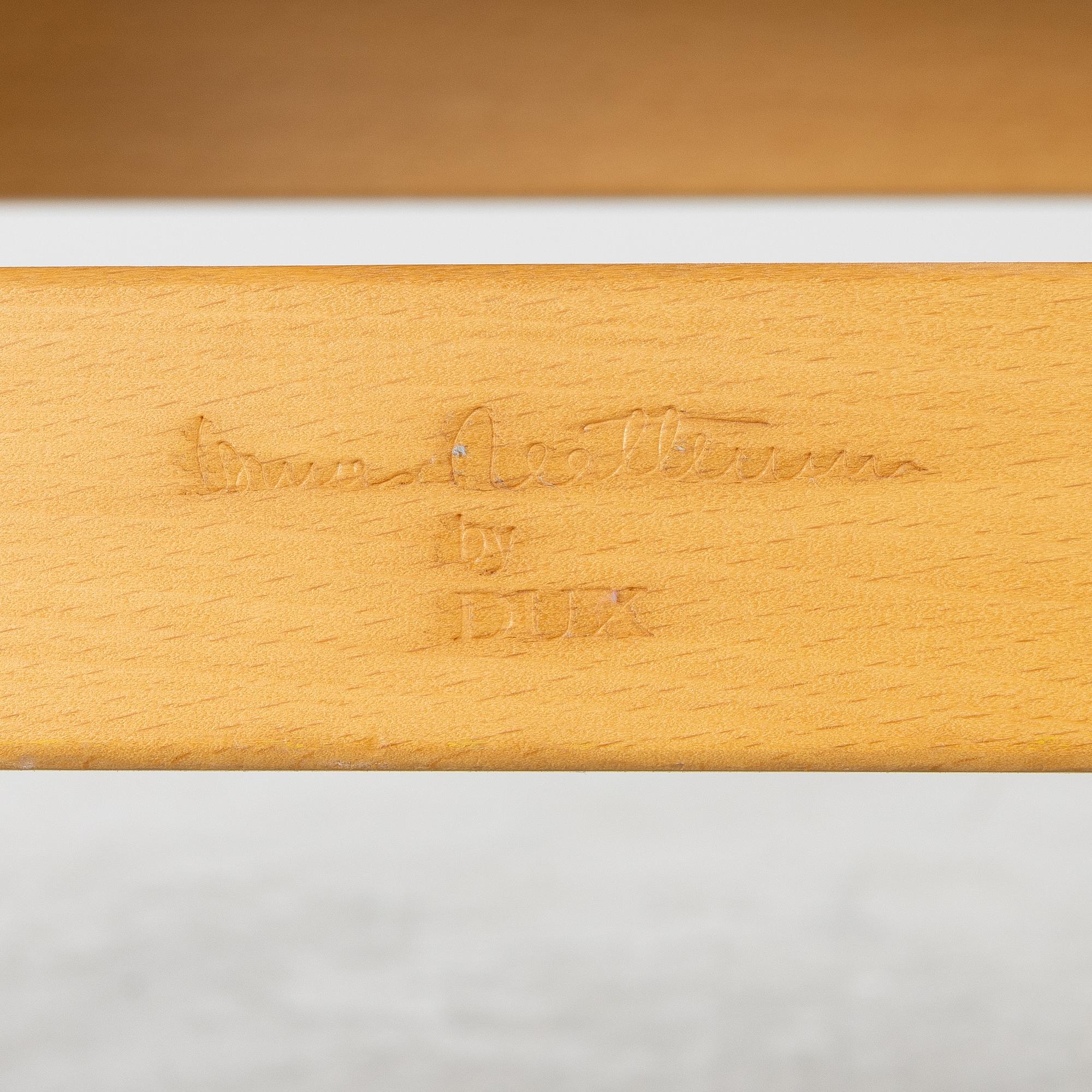 Bruno Mathsson, a pair of armchairs, "Eva", DUX, late 20th century.