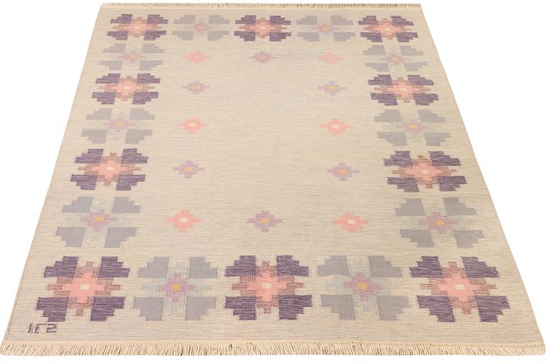 Ilsalestalon Mattolutomo, a flat weave carpet, Finland, c. 228 x 170 cm.