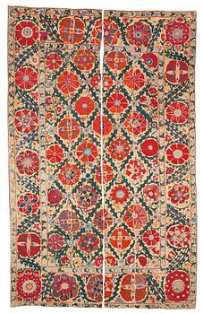 ANTIQUE UZBEK SUZANI EMBROIDERY. Two parts. 242,5 x 76 and 243,5 x 76,5 cm.