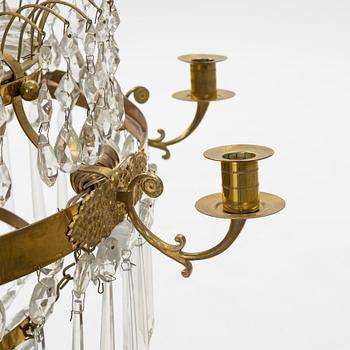 A Gustavian style 9 candle chandelier.