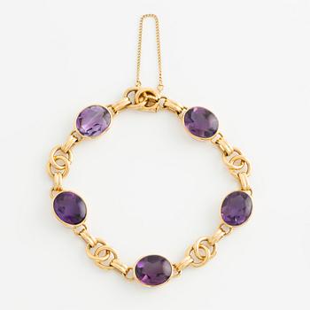 Bracelet and ring, 18K gold with cabochon-cut amethysts.