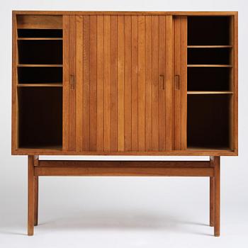 Jørgen Høj, an oak cabinet, Knud Willadsen Møbelsnedkeri, Lillerød, Denmark, 1950s.