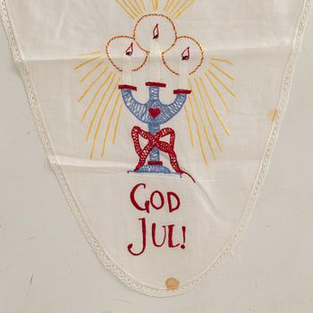 A collection of smaller Christmas tablecloths, runners, and wall hangings, approximately 34 pieces, mid/second half of the 20th century.